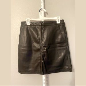 Black mini A-line pleather Loft skirt with pockets and rear zipper